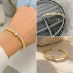 Gold Renk Baget Taşlı Oval Detaylı Kelepçe Bileklik