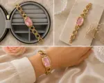 Pembe Kadranlı Gold Zincir Kordon Kadın Kol Saati