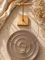 Zirkon Taşlı Göz Figürlü Gold Renk Zincir Kolye