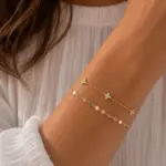 Gold Renk Zirkon Taşlı Yonca Figürlü ve Geometrik Pul Detaylı Katmanlı Bileklik