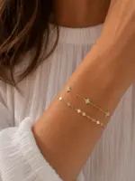 Gold Renk Zirkon Taşlı Yonca Figürlü ve Geometrik Pul Detaylı Katmanlı Bileklik