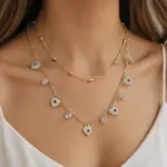 Gold Renk Çoklu Zincir Kalp ve Nazar Detaylı Kolye