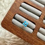 Okyanus Çiçeği: Mavi Papatya Piercing