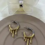 Eriyen Ay Damlası Çelik Küpe